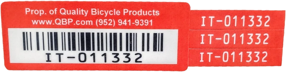 Quality Bicycle Products red asset tag with three tear-off number strips