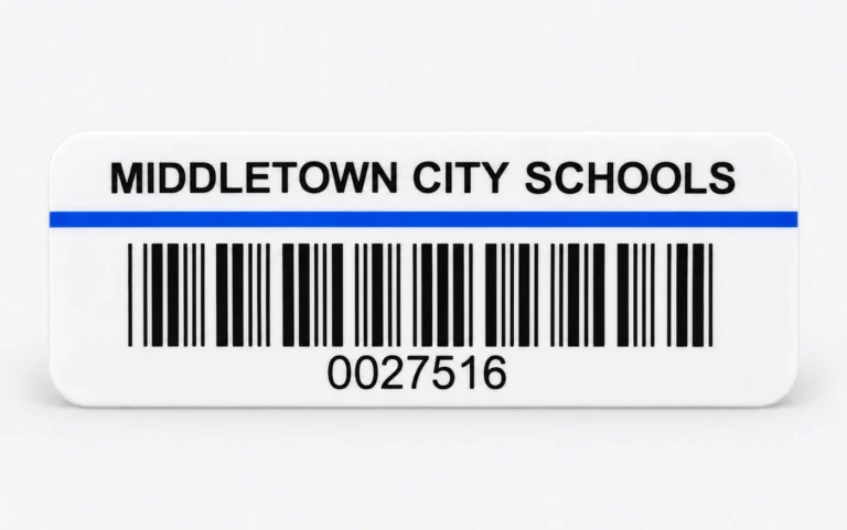 Middletown City Schools asset tag with a blue stripe, a barcode, and the number 0027516